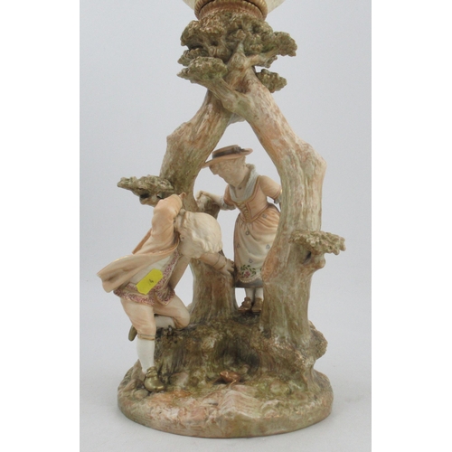 298 - A Royal Worcester blush ivory oil lamp, modelled with Kate Greenaway figures shape No. 1240, with as... 