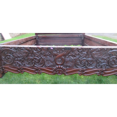 3 - An Antique carved rosewood double bed, carved with thistles and scrolls, width 66ins, length 84ins, ... 