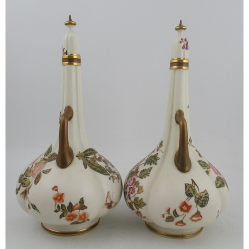 306 - A pair of Royal Worcester glided ivory quarter lobed vases, decorated with flowers and shot silk wit... 