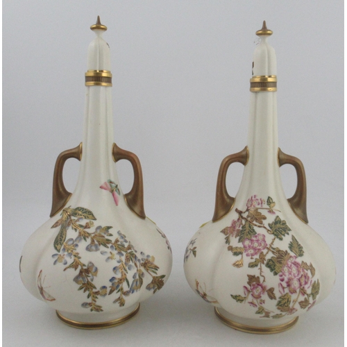 306 - A pair of Royal Worcester glided ivory quarter lobed vases, decorated with flowers and shot silk wit... 