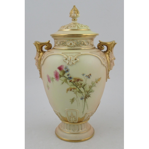 311 - A Royal Worcester blushed ivory vase, with associated cover, decorated with flowers, with masked han... 