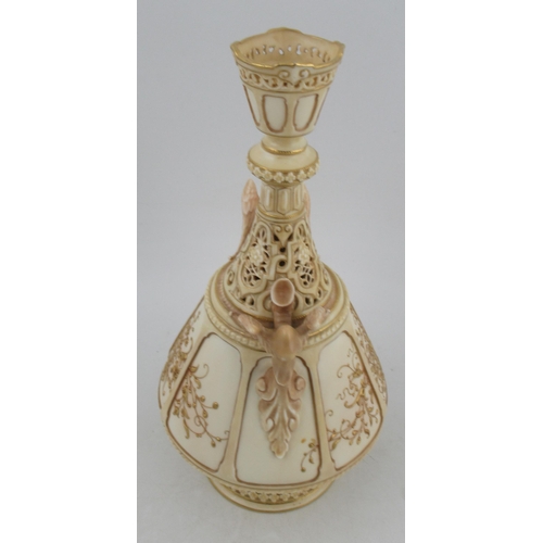 312 - A Royal Worcester Persian style gilded ivory vase, with pierced neck and fledgling bird handles, sha... 