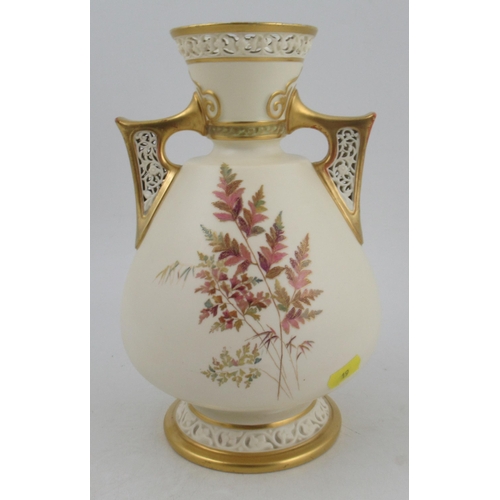 313 - A Royal Worcester gilded ivory vase, with pierced handles and neck, decorated with ferns shape No 10... 