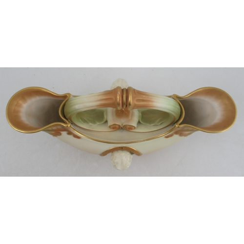 322 - A Royal Worcester double ended flower basket, with oval relief mask panels and in the classical styl... 