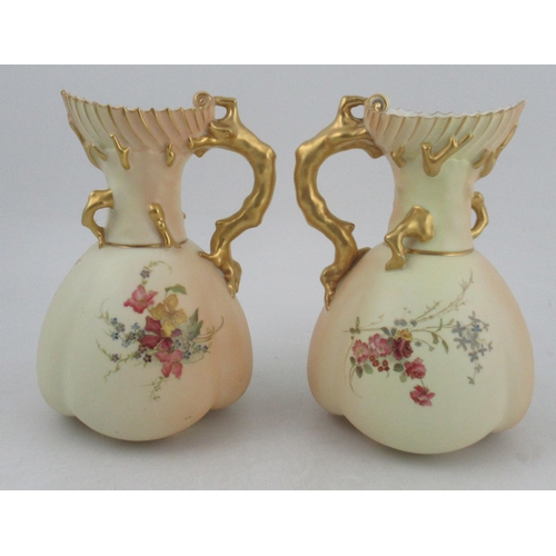 330 - A pair of Royal Worcester quarter lobbed blush ivory coral jugs, decorated with flowers, shape No 15... 