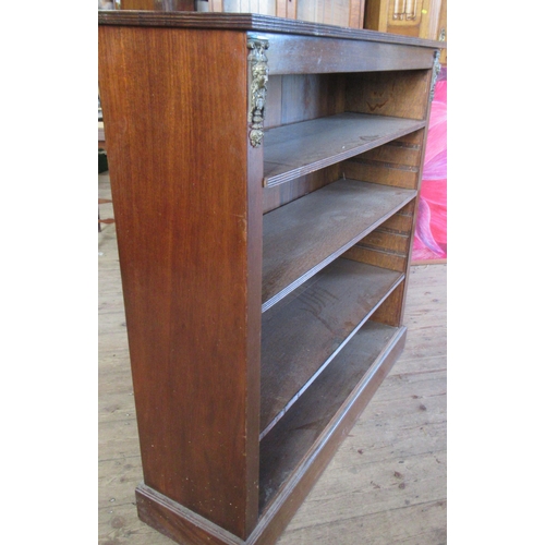 35 - A mahogany bookcase, with adjustable shelves and gilt metal mounts, 44ins x 14ins, height 46ins