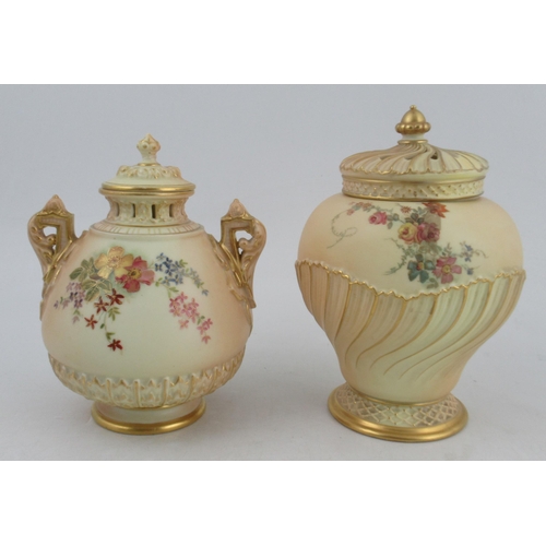 360 - A Royal Worcester covered vase, decorated with flowers to include a swirling body with blushed ivory... 