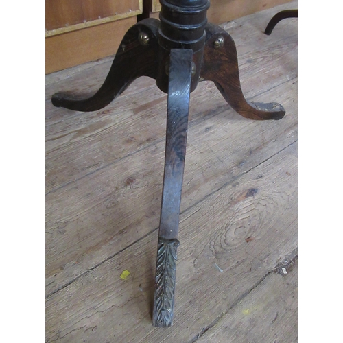 38 - A 19th century faux rosewood adjustable music stand, with brass mounts