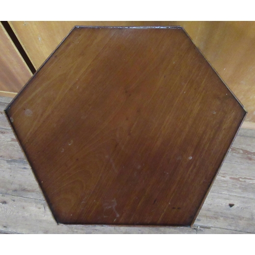 39 - A mahogany tripod table, with hexagonal top, diameter 14.5ins