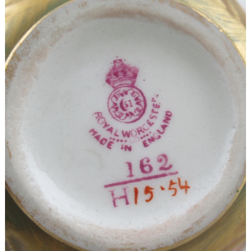 421 - A Royal Worcester covered vase, with quarter panels decorated with roses by Millie Hunt, shape No H1... 