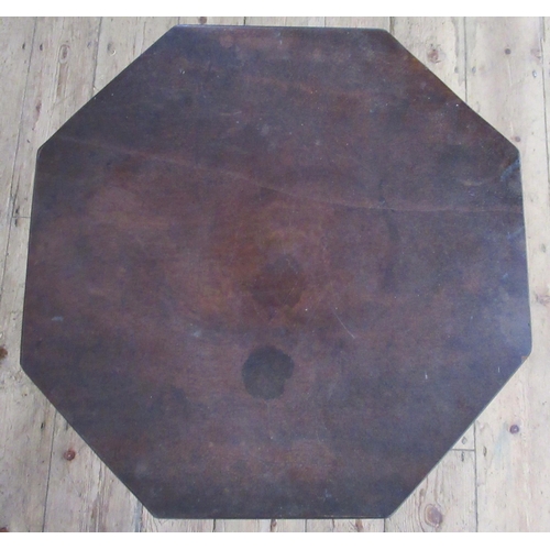 43 - A mahogany occasional table, with octagonal tilt top, diameter 16ins, height 26ins