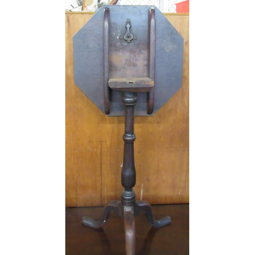 43 - A mahogany occasional table, with octagonal tilt top, diameter 16ins, height 26ins