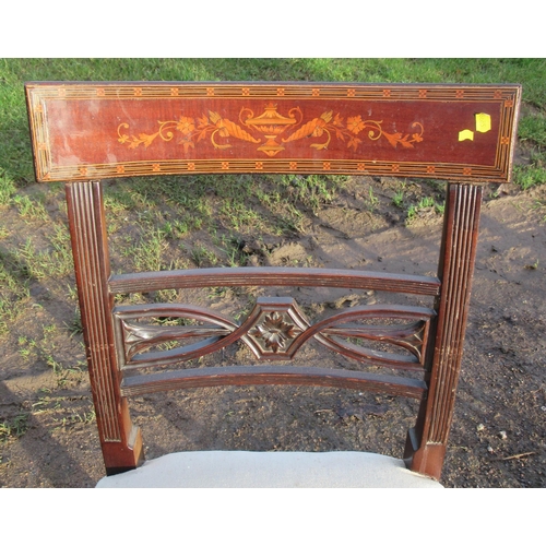 5 - A 19th century mahogany dining chair, the top back rail inlaid with urns and flower swags