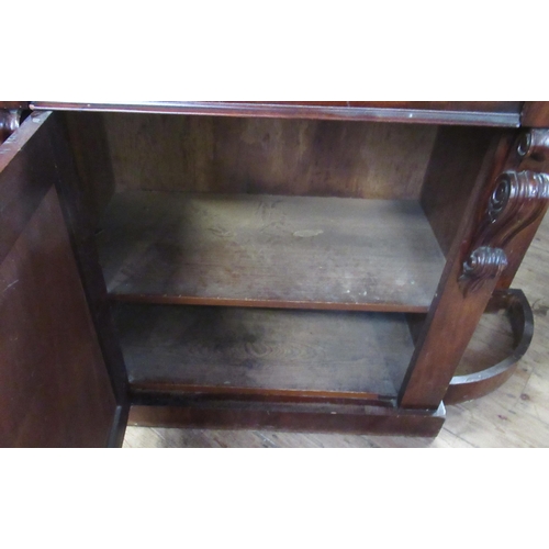 50 - A marble topped mahogany hall cabinet, fitted with a drawer over a cupboard, flanked by stick stands... 