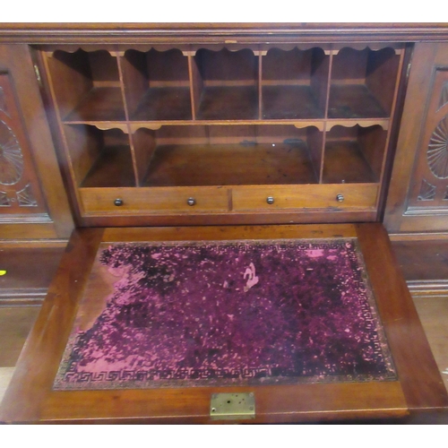 53 - An Edwardian mahogany desk, fitted with a fall flap with writing surface, reveling pigeon holes and ... 