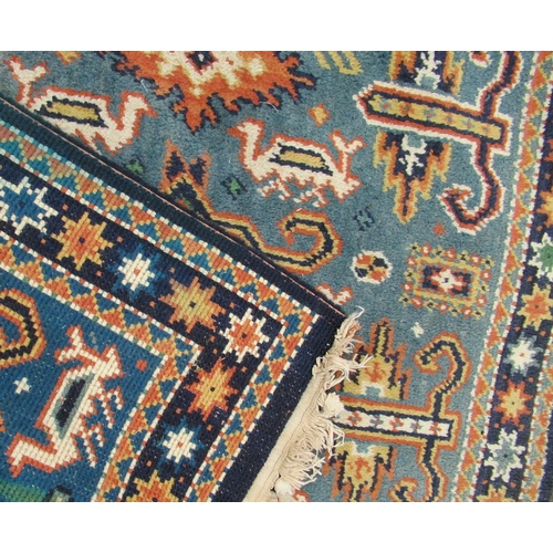 60 - A Kabistan Eastern design rug, decorated in blue and orange with repeating symbols, 39ins x 68ins, t... 