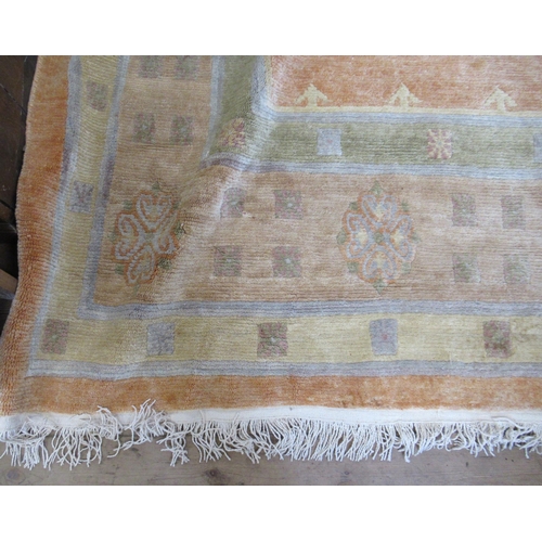 63 - A large Chinese style wool wash rug, 138ins x 168ins