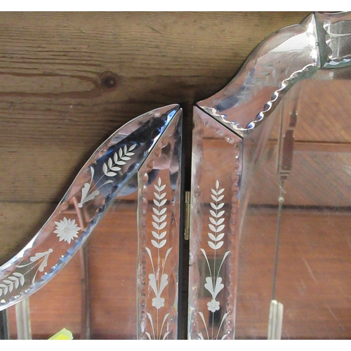 74 - A three fold dressing table mirror, with etched decorated to the mirrored frame