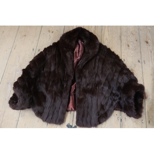 136 - A vintage fur coat and a fur stole