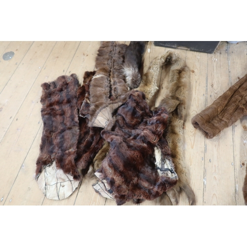 135 - A fur coat and assorted fur items