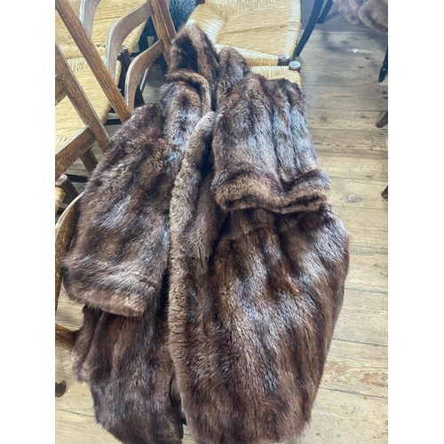 136A - A Vintage three quarter length fur coat