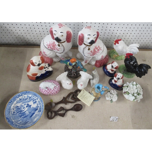 102 - A collection of porcelain, to include Staffordshire style dogs etc