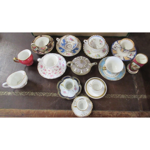 103 - A collection of cups and saucers, together with a Wedgwood tea pot, spill vase etc