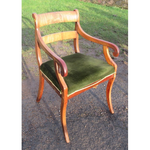 11 - A Regency sabre leg arm chair