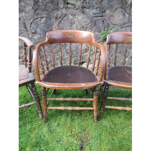 14 - A pair of oak curved back chairs, with spindle supports, together with two other chairs