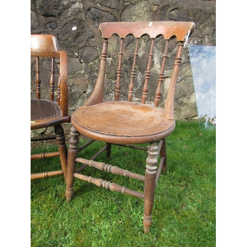 14 - A pair of oak curved back chairs, with spindle supports, together with two other chairs