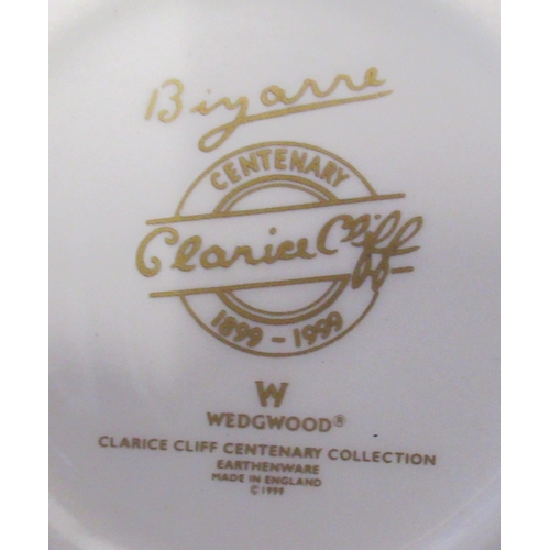 151 - A Wedgwood Clarice Cliff design conical sugar sifter, together with a trio, boxed with certificates