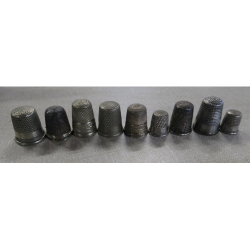 164 - 9 thimbles