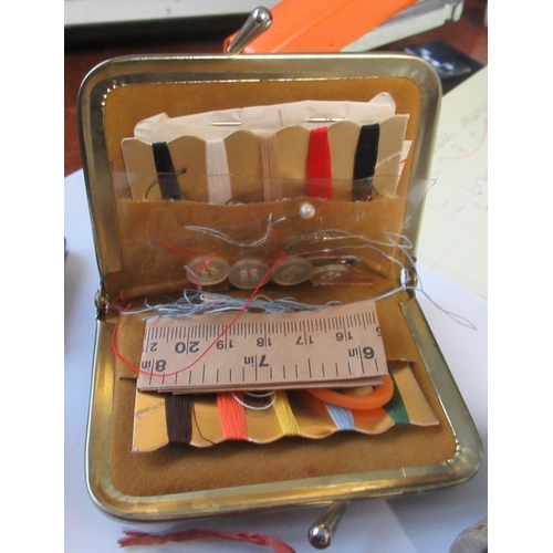 180 - A collection of novelty sewing related items, to include sewing cases, needle cases, a straw work ne... 