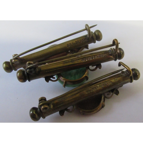 184 - Three Victorian gilt metal brooches, set with hardstones