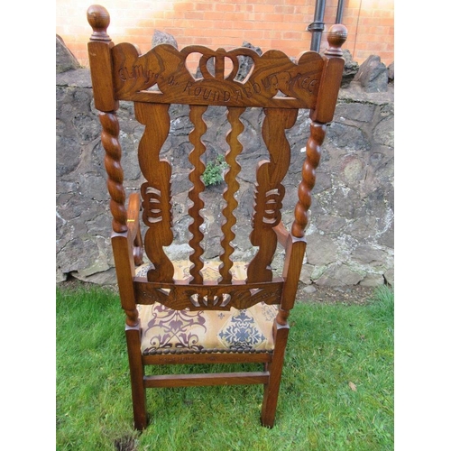 2 - An  antique elm open arm chair the pierced back decorated with craved crowns the back stamped, 