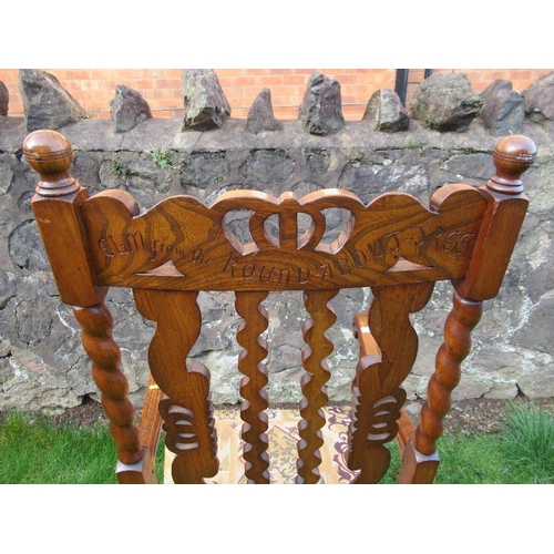 2 - An  antique elm open arm chair the pierced back decorated with craved crowns the back stamped, 