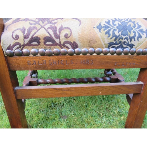 2 - An  antique elm open arm chair the pierced back decorated with craved crowns the back stamped, 