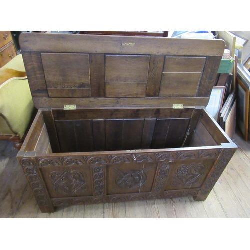 20 - An antique style oak coffer with fielded panels, width 47ins, depth 19ins, height 23ins