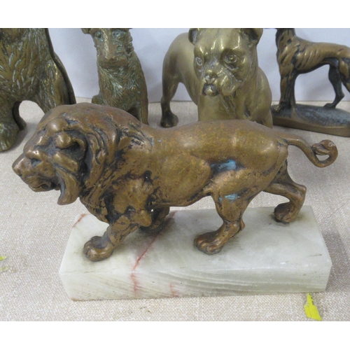 205 - A collection of brass models, to include dogs, a bear and lions