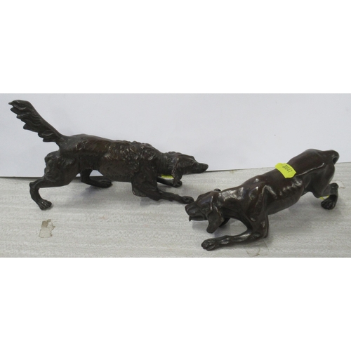 221 - Two bronze coloured models, of dogs, length 8ins and 9ins