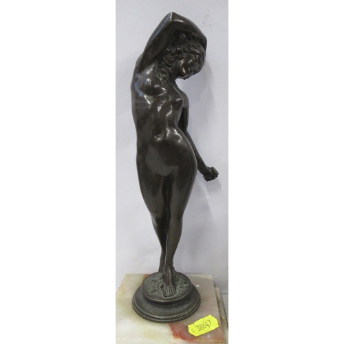 223 - A bronze figure, of a woman, on stepped marble base, height 12ins, together with two gilded metal fi... 