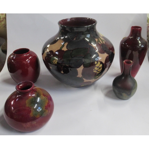 268 - Three Royal Doulton Flambe vases. together with a Tuscan Plant vase and another