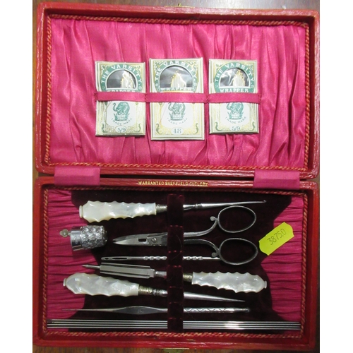 285 - Five 19th century cased sewing sets, some with mother of pearl handled tools