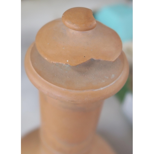 289 - A Wedgwood terracotta style covered vase, the top has multiple chips, height 9ins