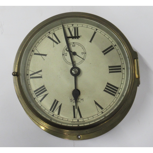 292 - A Smith Astral brass cased wall clock