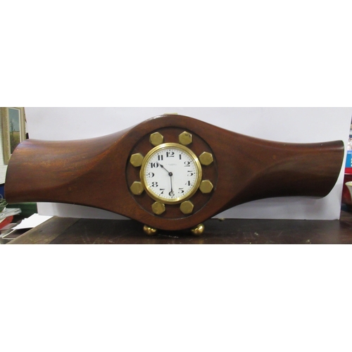 293 - A mahogany propeller clock, the movement marked Buren, the dial Wilson & Gill