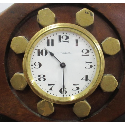 293 - A mahogany propeller clock, the movement marked Buren, the dial Wilson & Gill