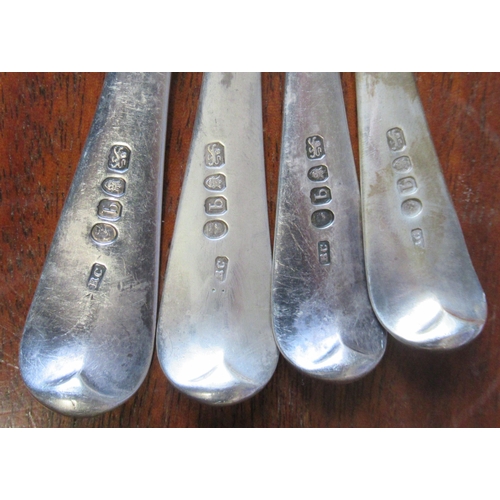 294 - A set of four Georgian silver serving spoons, engraved with an initial, together with two other Geor... 