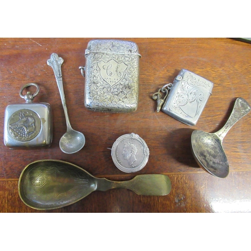 297 - Two silver vesta cases, a silver caddy spoons and other pieces of sliver plate