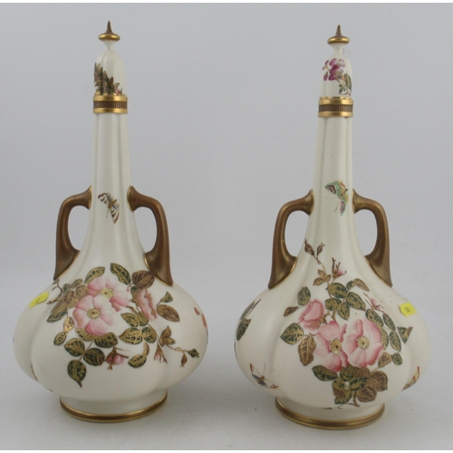 304 - A pair of Royal Worcester glided ivory quarter lobed vases, decorated with flowers and shot silk wit... 